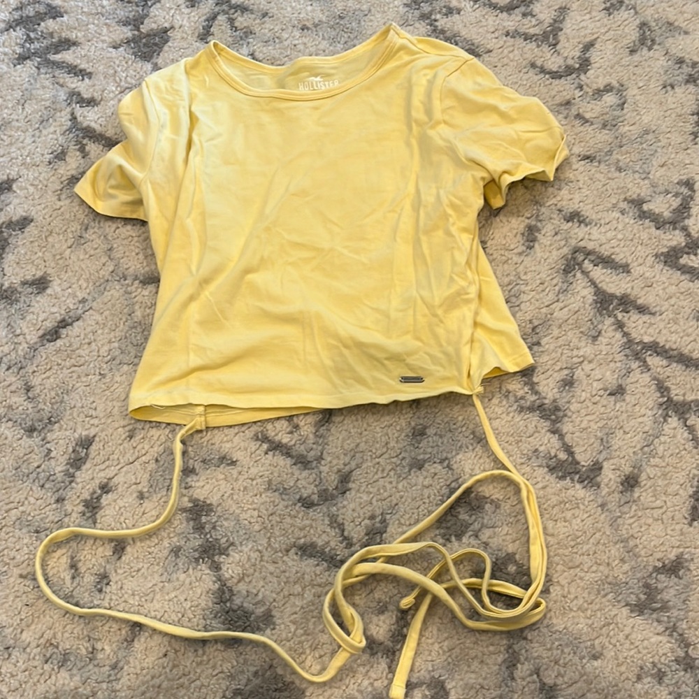 This shirt is yellow and from Hollister